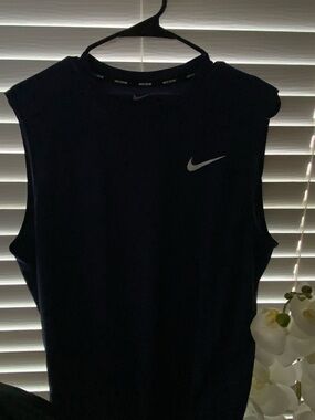 Nike Men’s Navy blue colors, never worn used. Sleeveless Dri-FIT Training Tank